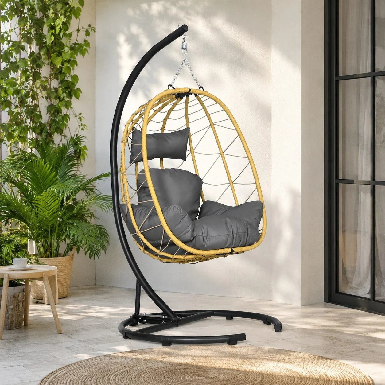 Scaun leagan suspendat, Wilona, ratan sintetic, galben si negru, perna gri, max 150 kg Scaun leagan suspendat, Wilona, ratan sintetic, galben si negru, perna gri, max 150 kg - imagine 1
